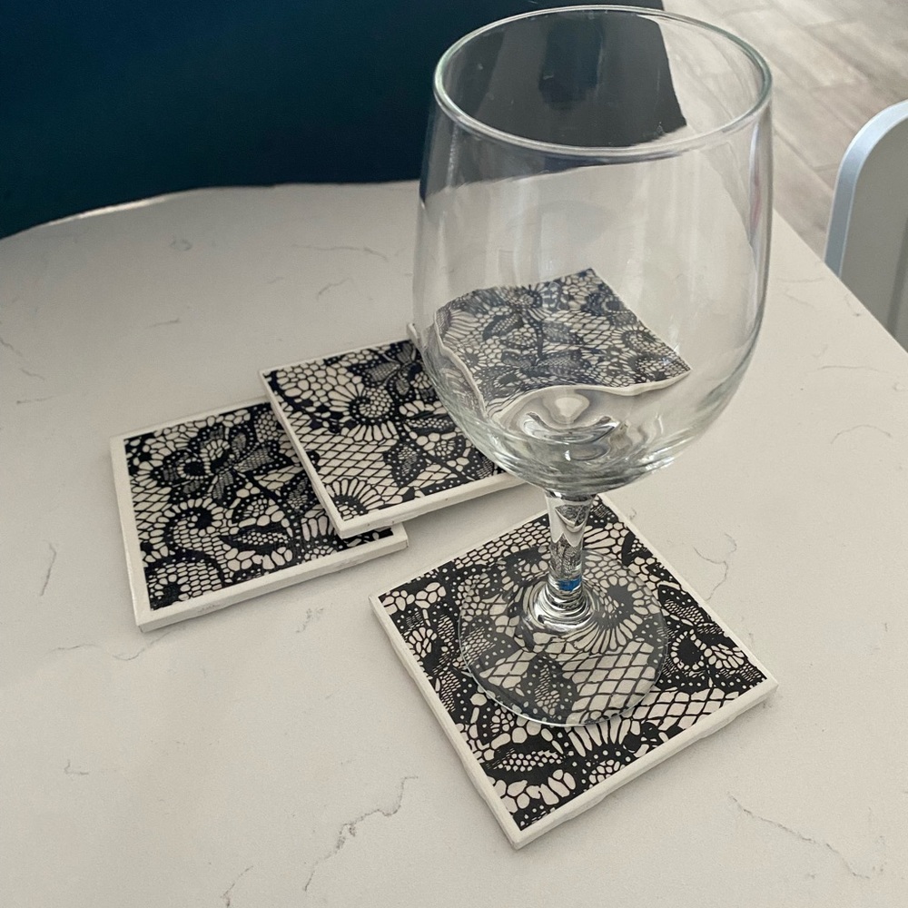 “black lace flower” coasters 
Hand made (by me!)